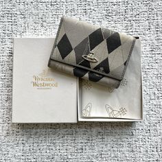 Vivienne Westwood Blue And Grey Argyle Wallet. Unisex. Snap Closure. 100% Leather. Made In Italy. Excellent Used Condition. Euc! Purchased On Poshmark. Comes With Original Box, Tissue Paper And Authenticity Cards. Length:4” Width:5.5” Depth:1” Vivienne Westwood Wallet, Vivienne Westwood Bags, Accessories Blue, Cute Wallets, Baby Boy 1st Birthday, What In My Bag, Luxury Wallet, Fashionista Clothes, Wallet Pouch