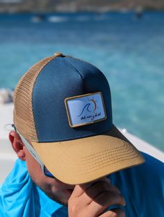 Embrace the perfect blend of style and comfort with our "Mar y Sol" Trucker Hats. Tailored for outdoor enthusiasts, these caps feature breathable mesh for coolness and a curved visor for sun protection. Whether sailing the seas or roaming the urban landscape, the distinctive "Mar y Sol" badge connects you with the spirit of nature and adventure. Available in two appealing colors: navy blue and beige, these hats are the ideal accessory for your next outdoor venture. Outdoor Trucker Hat With Uv Protection, Outdoor Uv Protection Trucker Hat, Navy Curved Brim Sun Hat For Outdoor, Outdoor Trucker Hat With Upf 50+ Protection, Outdoor Trucker Hat With Upf 50+, One Size, Outdoor Trucker Hat With Upf 50+, Outdoor Trucker Hat With Uv Protection, Adjustable Fit, Outdoor Snapback Trucker Hat With Upf 50+, Blue Trucker Hat With Curved Bill For Beach