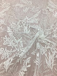 Welcome to my shop This stunning Lace Fabric design piece has soft hand feel, Perfect for wedding dress, evening dress, bridal wear, wedding gown, bodice or curtains, etc. This listing is for 1 yard, If you buy more, you will get an uncut piece. About Size : Lenght: 91cm (35.8inches); Wide: 130cm (51inches). Colors: Off-white Material: Polyester We offer special discounts for designers and wholesale orders! About Shipping: We transport free of charge through China Post. The United States usually Cream Floral Embroidered Fabric For Ceremony, Cream Embroidered Fabric With Floral Design For Ceremony, Ceremony Cream Embroidered Fabric, Cream Embroidered Fabric For Ceremony, Cream Wedding Embroidered Fabric, White Embroidered Fabric For Ceremony, Embroidered Fitted Fabric For Wedding, White Intricate Embroidered Fabric For Ceremony, White Embroidered Fabric For Ceremonies