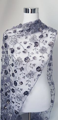 Silver / grey net shawl with silver floral pattern made with silver thread embroidery and sequins. Very elegant.  Gift it or keep it.  Size is approximate  Monitor colour is not accurate. Silver Shawl, Silver Scarf, Silver Embroidery, Bridal Wrap, Wrap Gift, Wedding Shawl, Gala Dinner, Net Fabric, Thread Embroidery