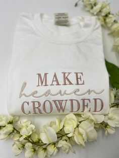 MAKE HEAVEN CROWDED Embroidered white Comfort Colors T-shirt,  embroidery t-shirts, Christian apparel, Christian Tshirt, Embroidered Christian tee 🎈WELCOME TO LoveStitchesCo If you are looking for soft, comfy, first-rate t-shirts, you're in the right place! Here at LoveStitchesCo, we love what we do and strive to make your shopping experience just right for you. If you have any questions, concerns, or comments about our products, feel free to shoot us a message anytime. Even on weekends and holidays, we'll try our best to respond as quickly as possible! 🎈 Embroidered Area Details - The design will be embroidered on a 7''x3.5'' area. 🎈Product Details Unisex T-Shirt: - Comfort Colors Brand - 100% cotton - Light/medium weight and extremely soft, this shirt is sure to be your next favorite White T-shirt With Embroidered Logo For Spring, White Crew Neck T-shirt With Floral Embroidery, Spring White T-shirt With Custom Embroidery, White T-shirt With Machine Embroidery, Short Sleeve, White Embroidered Text T-shirt For Spring, White Embroidered Crew Neck T-shirt, White Letter Embroidery T-shirt For Spring, White T-shirt With Letter Embroidery For Spring, White Embroidered T-shirt For Spring