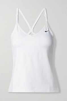 Nike's 'Indy' tank is perfect for low-impact workouts like walking and Pilates. Designed with lightly padded cups, it's made from the label's Dri-FIT fabric and blended with 72% recycled-polyester. Wear it with your favorite leggings.<br><br>This product Reduces Waste. Find out more about NET SUSTAIN <a href="https://www.net-a-porter.com/en-gb/campaigns/net-sustain">here.</a> Nike Tennis Clothes, White Activewear, Nike Tank Top, Tennis Top, Workout Clothing, Sporty Tank Top, Nike Top, Workout Clothes Women, Fitness Shirts