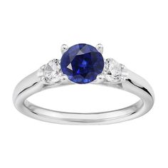 METAL SPECIFICATIONS White Gold 14K STONE SPECIFICATIONS Stone Name : Blue Sapphire and Diamond Stone Cut : Round Stone Details : There is one round cut sapphire approx. 1.50 carats (Approx. Dia. 7 mm) and two round diamonds approx. 0.12 carats each (Approx. Dia. 2.9 mm) on the sides. Natural earth mined stones. Color : F Clarity : VS1 Quality of Sapphire : AAA Total : Approx. 1.75 Carats RING SPECIFICATIONS Size : 6.5 (Can ship in any size, please send us a message about size after placing the Ceylon Sapphire, Diamond Anniversary Rings, Diamond Anniversary, Gadget Gifts, Natural Earth, Stone Cuts, 2 Carat, Sapphire Diamond, Diamond Stone