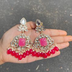 The Rani Krishanya Earrings are unique, and lightweight chandbalis with Kundan and Gold-Plating on beautiful beaded crystals. Specifications Materials used: Kundan, beaded crystals, Gold Plating Weight: 19 g Height: 3.5 inches At Romikas, we pride ourselves on the craftsmanship and high quality of our jewelry, designed to enhance your natural beauty. Please contact us with any questions. Party Chandbali Beaded Danglers, Celebration Chandbali Beaded Earrings, Beaded Chandbali Earrings For Celebration, Celebration Beaded Chandbali Earrings, Celebration Chandbali Danglers With Dangling Beads, Celebration Chandbalis With Dangling Beads, Beaded Earrings For Festivals And Celebrations, Beaded Earrings For Celebrations And Festivals, Festive Beaded Earrings With Dangling Beads As Gift