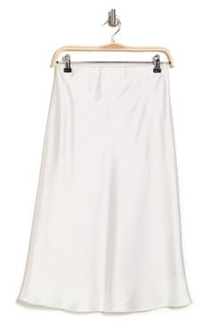 Elevate your wardrobe with this pull-on bias satin midi skirt for elegant, feminine style. 31" length (size S) Elasticized waist Pull-on style Satin construction 97% polyester, 3% spandex Machine wash cold, line dry Made in USA Model’s stats for sizing: 5’10” height, 34” bust, 27” waist, 35” hips. Model is wearing size S. Relaxed Satin Pencil Midi Skirt, Relaxed Fit Satin Midi Pencil Skirt, Chic White Satin Maxi Skirt, White Satin Skirt For Summer, Elegant Bias Cut Midi Skirt, White Flowy Satin Maxi Skirt, Spring Formal Satin Maxi Skirt, White Satin Skirt For Spring, Chic White Silk Maxi Skirt