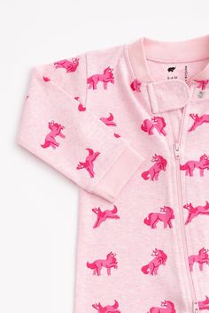 Our one-piece baby pajamas are crafted from our signature 100% organic cotton that’s “feel this” soft and free from harsh chemicals. Your baby will spend almost half their early years snoozing, so it’s a good feeling knowing they’re wrapped in safe, natural fabrics designed to support deep, cozy rest. Featuring a convenient double zipper for easy changes, this adorable essential makes diaper duty a breeze while keeping little ones snug and happy. With soft, breathable fabric, and playful prints, Pink Sleep Onesie, Playful Pink Onesie For Sleep, Playful Printed Pink Onesie, Baby Pajamas Girl, Pink Unicorn Print Sleepwear For Bedtime, Pink Unicorn Print Sleepwear, Baby Footie Pajamas, Good Feeling, Playful Unicorn Print Sleepwear