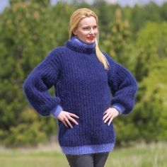 "READY TO SHIP  THICK AND FUZZY HAND KNITTED MOHAIR SWEATER by SuperTanya Brand: SuperTanya; Style: hand knitted mohair sweater; Material: premium class mohair; Color: Blue; Design: Ribbed design mohair sweater; Size L-XL Body length, measured from the shoulder top to the bottom end: 26.8″ / 68 cm; Chest width, measured at the back, between the underarms: 22.8″ / 58 cm; Sleeve length, measured from the neckline to the end of the cuff: 29.5″ / 75 cm Mock turtleneck: 3.5\" / 9 cm Net weight: 1.070 Fitted Blue Chunky Knit Sweater, Blue Hand Knitted Mohair Sweater, Blue Hand-knitted Mohair Sweater, Blue Mohair Knitted Sweater, Cozy Blue Mohair Sweater, Mohair Sweater, Sweater Material, Mock Turtleneck, Blue Design