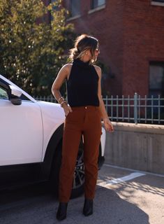 Crafted from luxurious denim, our Brick Denim Pants offer an effortless fall wardrobe addition. Featuring a button and zipper closure for easy on and off, comfortable high waisted fit, a straight leg, and flattering pocket details, these pants are perfect for pumpkin patch trips and dinner drinks. Soft to the touch and boasting neutral fall vibes, you'll love the style and comfort of our Brick Denim Pants. 100% Cotton Hand wash cold. Terra Cotta Pants Outfit, Fall Workwear Pants With Five Pockets, Chic Tapered Leg Fall Jeans, Brown High Rise Jeans For Work, Fall Workwear Straight Cargo Pants, High Rise Brown Jeans For Workwear, High Rise Brown Jeans For Work, High Rise Brown Pants For Fall, Fall Workwear Bottoms With Five Pockets