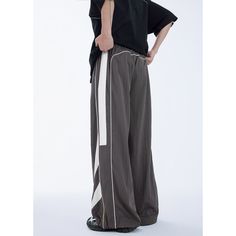 Water-Repellent Sports Patchwork Wide Leg Pants A Fabric: 90% Nylon+10% Spandex B Fabric: 55% Polyester+45% Nylon Size: S, M, L, XL Pants Type: Wide Leg Pants Multiple Color Selections: Black, Dark Gray  Season: Spring, Fall, Summer Nylon Wide-leg Pants For Streetwear, Casual Sports Bottoms With Contrast Color, Moisture-wicking Gray Pants For Streetwear, Stretch Pants With Contrast Color For Streetwear, Gray Wide Leg Sportswear Pants, Sporty Wide Leg Bottoms With Contrast Color, Sporty Gray Streetwear Pants, Gray Nylon Athleisure Bottoms, Nylon Wide Leg Parachute Pants For Sports