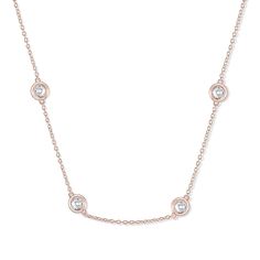 A Stunning Rose Gold Diamond By The Yard Necklace The Kali is a diamond by the yard style necklace, featuring a dainty chain adorned with four equidistant shimmering stones. Pair it with the Hana bracelet for a matching minimalist pair! Made with the highest quality 925 sterling silver, simulated diamonds, and plated in stunning rose gold, this piece will keep its radiance for years to come! This is a perfect addition to a proposal, can be used as a gift for a special occasion, or just to say, “I Love You.” High Quality & Conflict Free Our necklaces are all handmade and are crafted to perfection with a gorgeous alternative to a mined diamond. You’ll get all of the brilliance of a perfect and colorless diamond without having to spend a fortune. Our stones are cut to the highest quality stan Diamond By The Yard, Wedding Earrings Studs, Wedding Studs, Sparkle Gift, Wedding Earring, Studs Men, Bridal Jewelry Collection, Sparkle Necklace, Colorless Diamond