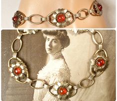 "I am SO thrilled to be offering a stunning Art Nouveau/Art Deco circa 1920s -1930s era 12 karat gold over sterling silver dark red glass cabochon flower link bracelet perfect for the Bride  The ornate flower shaped links feature deep red glass cabochon centers.  Note that it was tough to photo as the red is a true red/red with no hints of orange.   Bracelet measures 7 1/8 inches  (17.8 cm) around and is just under 5/8 inches at 9/16 inches (15 mm) wide.  This treasure is in excellent antique co Red Art Deco Jewelry For Wedding, Vintage Red Bracelets For Anniversary, Retro Round Jewelry For Weddings, Retro Jewelry For Weddings, Vintage Metal Bracelets For Weddings, Antique Wedding Bracelet With Vintage Charm, Vintage Red Bracelet For Wedding, Vintage Red Bracelets For Wedding, Vintage Wedding Bracelet Jewelry