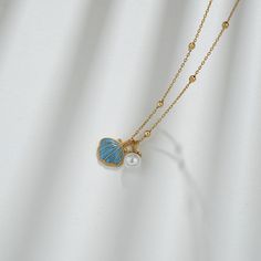 Description & Details Embrace the beauty of the sea with our meticulously crafted pieces that capture the essence of shells in stunning detail. From elegant shell-shaped pendants to intricate shell-inspired necklaces, our collection offers a range of styles to suit your unique taste. • Material: Solid 925 Sterling Silver ∙ Enamel• Finish: Hypoallergenic ∙ Gold Plating• Dimensions: 40 - 45 cm chain, adjustable• All our work is custom made by hand with love Pearl Charm Necklace, Enamel Stud Earrings, Silver Chain Style, Cross Chain, Enamel Necklaces, Gold Charm Necklace, Enamel Bracelet, Shell Necklace, Pearl Charms