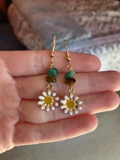 Homemade gold earrings using tiger's eye and jade rock beads with daisy charms Handmade Gold Daisy Earrings, Homemade Earrings, Daisy Charm, Daisy Earrings, Tiger's Eye, Jewelry Earrings Dangle, Vancouver, Gold Earrings, Etsy Earrings