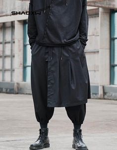 Design: Techwear, Ninja Techwear, Cyberpunk, Military, Futuristic Technical pants: This techwear pants is the perfect garment to complete your Techwear outfit. Suitable for men and women Premium quality: Reinforced seams, comfortable to wear, soft touch Materials: Polyester Machine washable: 30 °C (86 °F) FREE shipping Size(cm) Waist (cm) Waist (in) Length (cm) Length (in) S 78 30.71 88 34.57 M 82 32.28 89 35.04 L 86 33.86 90 35.51 XL 90 35.43 91 35.98 XXL 94 37.01 92 36.46 3XL 98 38.58 93 36.93 Black Harem Pants For Winter, Black Relaxed Fit Harem Pants For Winter, Cotton Techwear Harem Pants For Streetwear, Black Techwear Sweatpants For Spring, Winter Techwear Long Pants, Urban Stretch Pants For Winter, Baggy Urban Parachute Pants For Winter, Techwear Bottoms For Winter, Oversized Black Parachute Pants For Streetwear