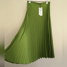 Shop chomoonlight's closet or find the perfect look from millions of stylists. Fast shipping and buyer protection. Thick and smooth, flowy satin effect pleated skirt with a beautiful sheen on every swish. Side zipper closure. S: waist: 13.5" M: waist: 14.5" Green Pleated A-line Skirt, Fitted Green Pleated Midi Skirt, Green Lined Midi Pleated Skirt, Chic Green Pleated Maxi Skirt, Chic Green Pleated Skirt, Green Pleated Skirt With Accordion Pleats For Summer, Green Accordion Pleats Skirt For Summer, Green Accordion Pleats Skirt For Spring, Green Long Pleated Skirt For Spring