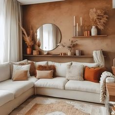 a living room filled with lots of furniture next to a large mirror and shelves on the wall