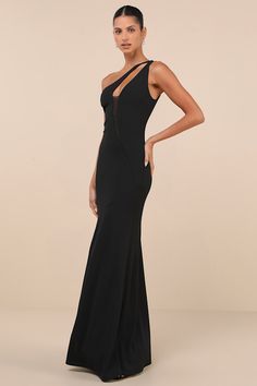 Leave the crowds speechless at the sight of you in the Lulus Mesmerizing Energy Black Cutout One-Shoulder Mermaid Maxi Dress! This exquisite dress has a stretchy crepe knit fabrication that shapes a one-shoulder neckline with a sexy cutout strap that flows into a darted bodice with an asymmetrical mesh insert at the center. The figure-skimming silhouette features asymmetrical seaming as it continues into a flattering mermaid skirt with an elegant maxi hem. Fit: This garment fits true to size. Le Fitted One Shoulder Mermaid Dress For Gala, One-shoulder Fitted Mermaid Dress For Gala, Fitted One-shoulder Mermaid Dress For Gala, One-shoulder Elastane Maxi Dress, Elastane One Shoulder Dress For Parties, Stretch Off-shoulder Evening Dress For Prom, Off-shoulder Stretch Evening Dress For Prom, Black Fitted One-shoulder Dress For Prom, Fitted Black One-shoulder Dress For Prom