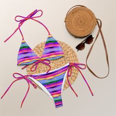 Stay comfortable and stylish all summer with this All-Over Print Recycled String Bikini set. It’s made from soft recycled polyester with double-layering and UPF 50+. Style the straps how you like, and get ready to swim! • Soft and stretchy material with UPF 50+ • Sizes up to 6XL • Bikini top comes with removable padding for comfort • Multiple ways to tie and style the bikini set • Color design options for swimwear lining Disclaimers: • Due to the 2-layered construction and internal stitching, a 50 Style, Upf 50, Stretchy Material, String Bikinis, Color Design, Layering, Recycling, Stitching, Color