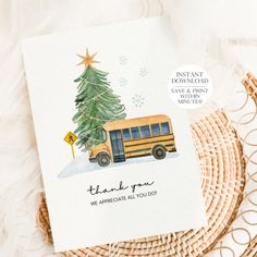 a yellow school bus with a christmas tree on the front and thank you card below