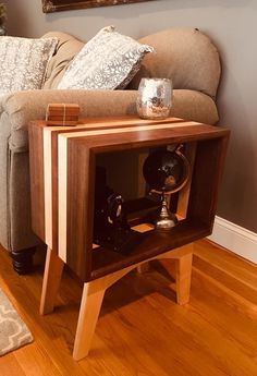 a coffee table with an old record player on it