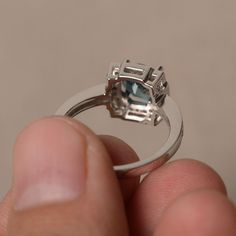 This is a gorgeous handmade creation. Its beauty is its simplicity & Elegance. The 7*7mm round cut London blue topaz is crafted in solid sterling silver and with rhodium plated. All item is sent in a beautiful gift box You can realize more lovely stuff clicking the link https://www.etsy.com/shop/knightjewelry?refshopsection_shophome_leftnav Please leave the correct address and you phone number for delivering successfully. Aquamarine Diamond Ring With Halo Setting, Blue Topaz Rings With Halo Setting In Round Cut, White Gold Aquamarine Topaz Ring With Prong Setting, Blue Topaz Rings With Halo Setting, Silver Diamond Ring With Blue Topaz And Halo Setting, Silver Topaz Ring With Round Blue Topaz, Silver Topaz Ring With Round Cut Gemstone, Silver Blue Topaz Diamond Ring With Halo Setting, Silver Blue Topaz Ring With Round Stone