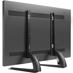 two computer monitors are shown side by side with the same monitor facing each other and one is turned on