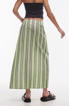 A sarong-style maxi skirt made from lightweight cotton features smart stripes and buckle closure at the waist. 35" length (size 8) Waist buckle closure 100% cotton Machine wash, line dry Imported part lined Sarong Style, Maxi Skirt Style, Satin Maxi Skirt, Sarong Skirt, Striped Jersey, Denim Maxi Skirt, Satin Maxi, Gray Skirt, Sarong