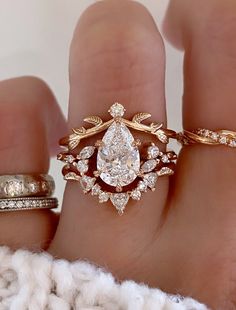 caption:Shown with 1.5ct pear Moon Rock Wedding Ring, Engagement Rings Queen, Rose Gold Engagement Ring Stack, Clear Quartz Engagement Ring, Bride Wedding Ring Gold, Crown Setting Engagement Ring, Vintage Pear Cut Engagement Rings, Vintage Princess Cut Engagement Ring, Gold Teardrop Wedding Ring