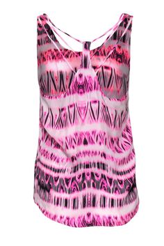 Add a fun pop of color to your summertime wardrobe with this silk tank from Parker! With an airbrushed tribal print, this is a laid back top to wear with all your favorite denim shorts and skirts! Lace up some chunky sneakers for a trendy, casual look. Size S 100% Silk Racerback design Scoop neckline Fully lined No closures Waist 26" Total length 26" Printed Stretch Tank Top For Summer, Casual Pink Tops With Abstract Print, Summer Multicolor Print Stretch Tops, Stretch Multicolor Print Summer Tops, Multicolor Graphic Print Tops For Beachwear, Stretch Multicolor Print Tops For Summer, Casual Pink Top With Abstract Print, Multicolor Graphic Print Beachwear Top, Trendy Printed Tie Dye Tops