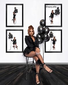 a woman is sitting on a chair with balloons in front of her and posing for the camera