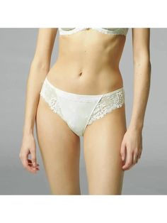 Simone Perele Wish Brief Panty 12B720 in ivory color - front Elegant Lace Bottoms With Lace Trim, Elegant Stretch Lace String, Feminine Sheer Stretch Bottoms, Elegant Stretch String Lace, Feminine Lace Stretch Bottoms, Feminine Fitted Bottoms With Contrast Lace, Sheer Lace Brief Bottoms, Lace Brief Bottoms With Contrast Lace, Feminine Fitted Sheer Bottoms