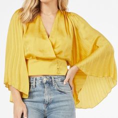 Posh Ambassador-Fast Shipper Same Day/Next Day Shipping Brand: Favlux Color: Sulphur Yellow Size: S (4/6) Bust: 34.5-35.5 Waist: 26.5-27.5 Flowy Pleated Sleeves Wrap Front Detail With Button Closure Fabric Type: 100% Polyester This Brand New Blouse Is Ready To Ship Out Today! Yellow V-neck Top For Party, Chic Yellow Fall Top, Chic Yellow Cropped Tops, Chic Yellow Cropped Blouse, Chic Yellow Tops For Fall, Chic Cropped Yellow Tops, Chic Yellow V-neck Top, Chic Yellow Top For Brunch, Elegant Yellow Blouse For Brunch