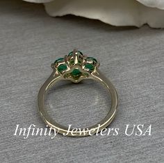 Emerald Ring 14k Yellow Gold, Round Cut Emerald Engagement Ring, Dainty Emerald Gold Ring, May Birthstone Ring, Cluster Emerald Ring #6787 Ladies Emerald Ring, Family Birthstone Ring, 14k Yellow Gold, Mothers Ring, May Birthstone Ring, #6787 This ring is a lab created 4 stone round emeralds made with pure 14k yellow gold #6773 Would make a perfect gift for a May Birthday, Mothers Ring, a graduation, anniversary, bridal gift or just a gift for her. We also have a pendant and earrings to complete Cluster Emerald Ring With Center Stone, Green Emerald Cluster Ring With Center Stone, Green Emerald Ring Stamped 14k For Wedding, Halo Ring With Prong Setting For Anniversary, Fine Jewelry Halo Ring For May Birthstone Anniversary, Green Halo Ring With Prong Setting For Anniversary, Promise Ring Halo With Prong Setting For May Birthstone, Promise Ring With Prong Setting For May Birthstone, Anniversary Emerald Cluster Ring With Halo Setting