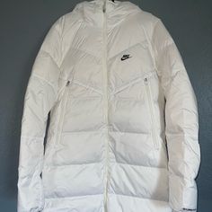 New Nike Sportswear Down-Fill Windrunner Shield Long Down Jacket White Size Small Tall White Nylon Track Jacket For Winter, White Functional Sports Outerwear, White Nylon Sports Outerwear, Sporty White Nylon Outerwear, White Sporty Nylon Outerwear, White Nylon Outerwear For Sports, Winter Sporty Nylon Sport Coat, Sporty Nylon Sport Coat For Winter, White Athleisure Nylon Outerwear