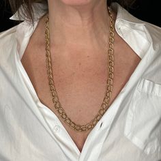 This modern 14k yellow gold chain necklace has a beautiful feel. At twenty-five inches in length, this necklace is able to be doubled up around the neck or just worn as a single stand. The ease of the necklaces design makes it an excellent way to dress up any outfit. Timeless Gold-tone Oval Link Necklace, Formal Double Strand Long Necklace, Elegant Yellow Gold Chain Necklace For Everyday Luxury, Elegant Double Strand Long Necklace For Formal Occasions, Elegant Double Chain Necklace, Elegant Gold-tone Chain Necklace, Luxury Gold Long Chain Necklace, Elegant Gold Oval Link Chain Necklace, Elegant Gold-tone Cable Chain Necklace