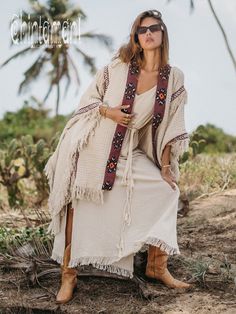 Beige Long Bohemian Kimono, Beige Bohemian Long Kimono, Bohemian Tassel Kaftan For Festivals, Bohemian Kaftan With Tassels For Festivals, Bohemian Tasseled Kaftan For Festivals, Bohemian Beige Poncho For Fall, Beige Bohemian Shawl Poncho, Bohemian Handwoven Poncho For Festival, Bohemian Handwoven Shawl Poncho