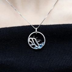 "Dive into a world of Arctic whimsy with our delightful sterling silver and gold necklace, featuring a charming image of three playful penguins frolicking on an iceberg, accented with your choice of blue topaz, nano-sapphire, or rhodolite gemstones. 🐧❄️💎✨ This enchanting piece captures the joy and camaraderie of these beloved creatures in their icy habitat. Meticulously crafted with intricate detailing, the penguins evoke a sense of curiosity and friendship, inviting you to join in their playf Silver And Gold Necklace, Playful Penguins, Silver And Gold, Sterling Silver Necklaces, Habitat, Blue Topaz, Penguins, Topaz, Silver Necklace