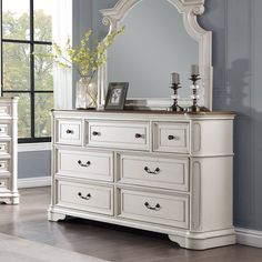 Classic design elements never go out of style the Florian collection is designed for the traditional home. The antique white finish gives off the right amount of distressing for a worn-in feel. Case goods offer a natural wooden finish for contrast against the antique white finish. The dresser includes a safety stop mechanism, which prevents the drawers from being fully pulled out and ensures that they remain securely in place. This feature adds an extra layer of safety, especially if there are c