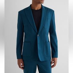 Express Slim Teal Stretch Cotton-Blend Suit Jacket - Nwt This Slim Fit Suit Jacket Is Made With Stretch For All Day Comfort That Moves With You. Bold Teal Color For Standout Style. Features & Fabric: -Narrow Through Shoulders, Chest And Waist -Peak Lapels, 2 Button Front, Long Sleeve Button Cuffs -Patch Chest And Hand Pockets -Side Back Vents, Straight Hem -Cotton/Nylon/Spandex -Dry Clean Elegant Blue Suits With Patch Pockets, Blue Blazer With Patch Pockets For Office, Blue Office Blazer With Patch Pockets, Elegant Blue Blazer With Patch Pockets, Elegant Blue Sport Coat With Patch Pockets, Blue Suits With Patch Pockets For Work, Semi-formal Blue Blazer With Patch Pockets, Blue Blazer With Patch Pockets For Fall, Blue Semi-formal Blazer With Patch Pockets