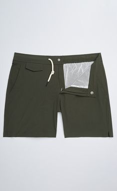 A classic piece for summer, our swim shorts provide elegant styling at the beach or by the pool. The nylon/spandex blend fabric is quick-drying and offers comfortable stretch. The elasticated waistband is designed for a comfortable, flexible fit, and the traditional waist drawstring keeps them securely fastened. Other details include a YKK zipper fly and multiple pockets for plenty of storage space. A smart look both in and out of the water, you can wear them for a swim or grabbing drinks at a poolside bar. Poolside Bar, Swim Shorts, Dark Navy, The Pool, At The Beach, Storage Spaces, The Beach, Swimming, Pool