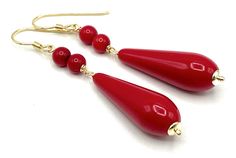 A pair of elegant earrings crafted with Italian 24 K Gold Vermeil, red coral and long red resin drops. LENGTH:  2.6 inches - 6,7 cm  WEIGTH: 5 gr.  Drop: 30 x 10 mm MATERIALS: 24 K Gold Vermeil over 925 Sterling Silver - Made in Italy Coral Resin DELIVERY: All jewellery is shipped in a working day with registered mail. All orders come packaged in a pouch drawstring bag Sofia's Bijoux: http://www.etsy.com/it/shop/Sofiasbijoux More Earrings: https://www.etsy.com/uk/shop/Sofiasbijoux?ref=simple-sho Handmade Red Dangle Bridal Earrings, Handmade Red Bridal Dangle Earrings, Handmade Red Earrings For Formal Occasions, Red Pierced Wedding Earrings, Red Pierced Earrings For Wedding, Classic Red Earrings For Party, Red Teardrop Earrings For Formal Occasions, Classic Red Party Earrings, Classic Red Dangle Earrings