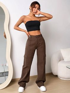 Elevate your denim game with our High Waist Cargo Jeans. These jeans feature a high waistline that flatters your figure and adds a trendy touch. With cargo-style pockets, they offer both style and functionality. Made from premium denim, these jeans provide comfort, durability, and a fashion-forward look. Perfect for adding an edgy twist to your casual outfits, our High Waist Cargo Jeans are a must-have in your wardrobe. Details: Color: Brown Pattern Type: Plain Type: Wide Leg Jeans Style: Cargo Trendy Brown High-waist Jeans, Trendy Brown High Waist Jeans, Trendy High Waist Brown Jeans, Brown High-waist Jeans For Streetwear, Brown Casual Flare Jeans With Pockets, Fall Utility Flare Jeans, High Waist Brown Jeans, High-waisted Brown Jeans With Pockets, High Waist Brown Jeans With Pockets