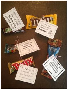 several candy bars are laid out on a table