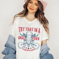 Try That In A Small Town Tee White / S Peachy Sunday T-Shirt Casual Soft-washed Shirt For Fall, Soft-washed T-shirt For Casual Fall Gatherings, Classic Graphic Print Top For Fall, Fitted Cotton T-shirt For Casual Gatherings, Fitted Cotton T-shirt For Casual Wear, Casual Pre-shrunk Shirt For Everyday, Trendy Pre-shrunk Cotton Shirt, Spring Soft-washed White Shirt, Casual Soft-washed Spring Shirt