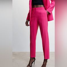 New With Tags. Beautiful Hot Pink Suit Pants. Flowy Fabric. Straight Design. Cropped Design. Two Side Pockets. Two Welt Pockets On The Back. Dart Detail. Elasticated Waist. Concealed Button, Hook And Zip Fastening. Party And Events Collection. Fitted Spring Pantsuit With Tapered Leg, Fitted Tapered Leg Pantsuit For Spring, Pink Straight Leg Pantsuit For Spring, Tailored Pink Bottoms For Office, Tailored Pink Summer Pants, Pink Tailored Bottoms For Office, Tailored Pink Pants For Summer, Pink Straight Leg Office Pants, Pink Tapered Leg Bottoms For Work