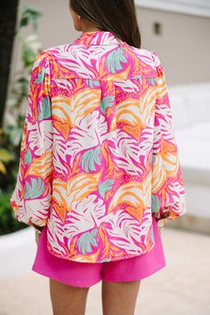 Trust me, you are going to want this button down blouse at your finger tips this spring and summer! That print and those hues are wonderfully bold and bright! You are going to love that this blouse can go from the office to the boardwalk too! Collared neckline Button down front closure Long bubble sleeves Colorful abstract print No stretch Sydney is wearing the small. Vacation Button-up Blouse With Tropical Print, Vacation Tropical Print Button-up Blouse, Tropical Print Button-up Blouse For Vacation, Summer Long Sleeve Blouse With Vibrant Print, Tropical Long Sleeve Blouse For Vacation, Vibrant Long Sleeve Vacation Blouse, Multicolor Button-up Summer Blouse, Multicolor Print Button-up Top For Vacation, Vibrant Long Sleeve Blouse For Vacation