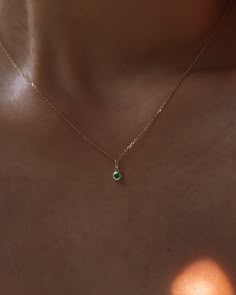 Product Description Introducing a timeless and elegant charm to adorn your chest every day. Featuring an ethical lab-grown Emerald charm in a bezel setting handcrafted in 14k recycled solid gold. Please note that this charm faces forward when attached to a necklace chain. When worn with hoop earrings, it will face sideways. ………………………………….D E T A I L S Sold as a single charm (can be attached/removed from the chain) Charm measures 2.5mm Total weight: 0.18g Material: 14k Recycled Solid Gold and Lab-grown Emerald Emerald Pendants, Minimalist Gold Emerald Necklace With Delicate Chain, Dainty Gold Necklace With Emerald, Minimalistic Necklace, Minimalist Gold Emerald Necklace, Dainty Gold Emerald Necklace, Luxury Minimalist Emerald Necklace, Necklace Pendant, Girly Necklace