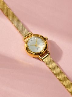 This dainty round face watch, features a slim gold mesh wrist band. Slim in style, this watch is perfect to add to a wrist stacked with bracelets or alone for a sophisticated style. Women Watches Waterproof, Women Watches Sport, Cheap Minimalist Watches, Small Womans Watch, Cheap Women's Watches With Subdials, Watches Young Women, Women’s Silver And Gold Watch Band, Women Watch Petite, Affordable Classic Metal Watch Accessories