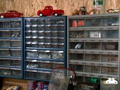 the shelves are filled with various types of toy cars and other items in storage bins