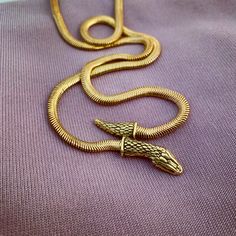 by Anomaly Jewelry Dragon Queen, Gold Snake Chain, Snake Head, Different Meaning, Heads And Tails, Nyc Studio, Snake Chain Necklace, Snake Necklace, Gold Snake